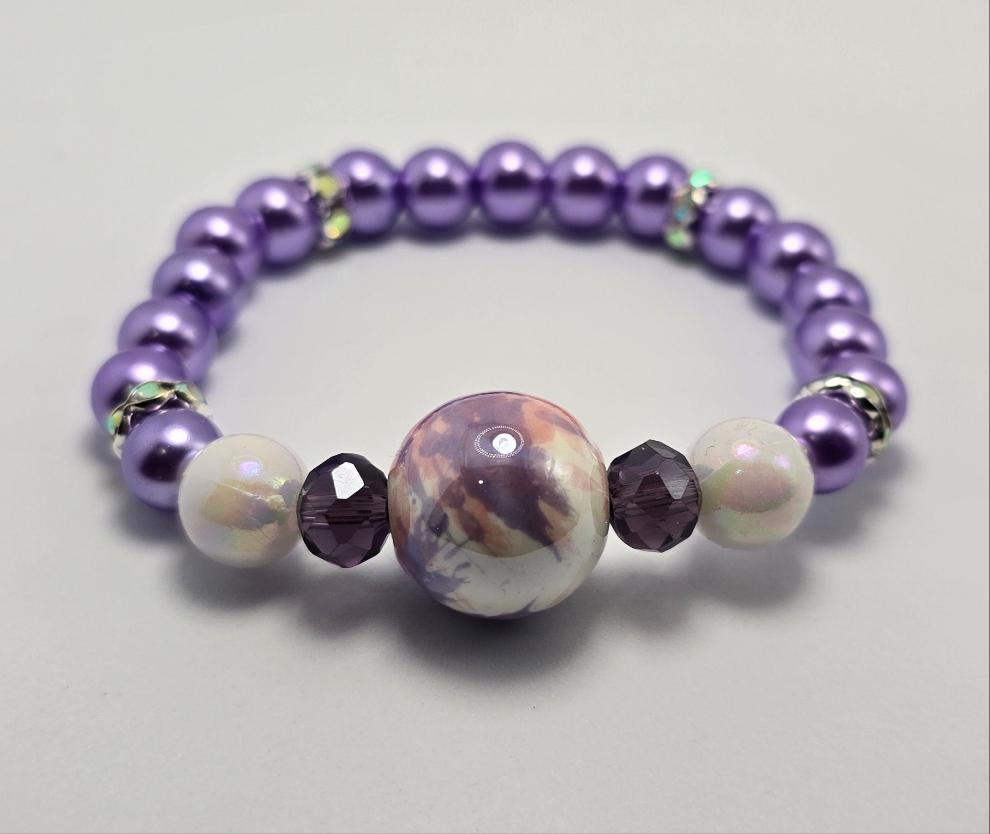 Purple Bracelet with multi colored charm