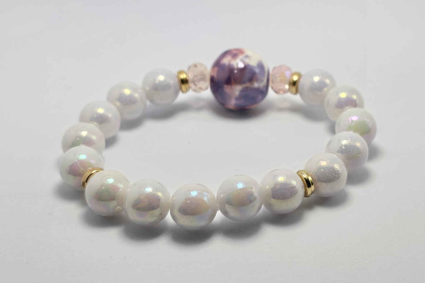 Classy Pearl Bracelet with multi colored charm
